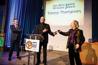 Harry Shearer presents Danny Thompson with the newly-named Chris Squire Virtuoso Award.