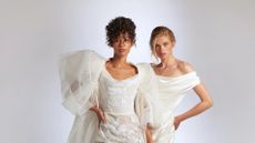 Two models wearing dresses from the Vivienne Westwood bridal collection