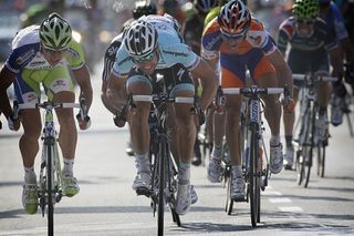 Tom Boonen (Omega Pharma-Quickstep) powers to the win in Gent-Wevelgem ahead of Peter Sagan (Liquigas-Cannondale) and Matti Breschel (Rabobank)