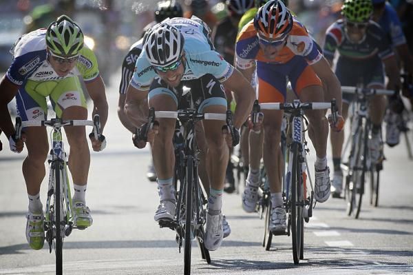 Tom Boonen (Omega Pharma-Quickstep) powers to the win in Gent-Wevelgem ahead of Peter Sagan (Liquigas-Cannondale) and Matti Breschel (Rabobank)