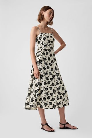 Vestido midi de lino con estampado floral blanco y tirantes extraíbles