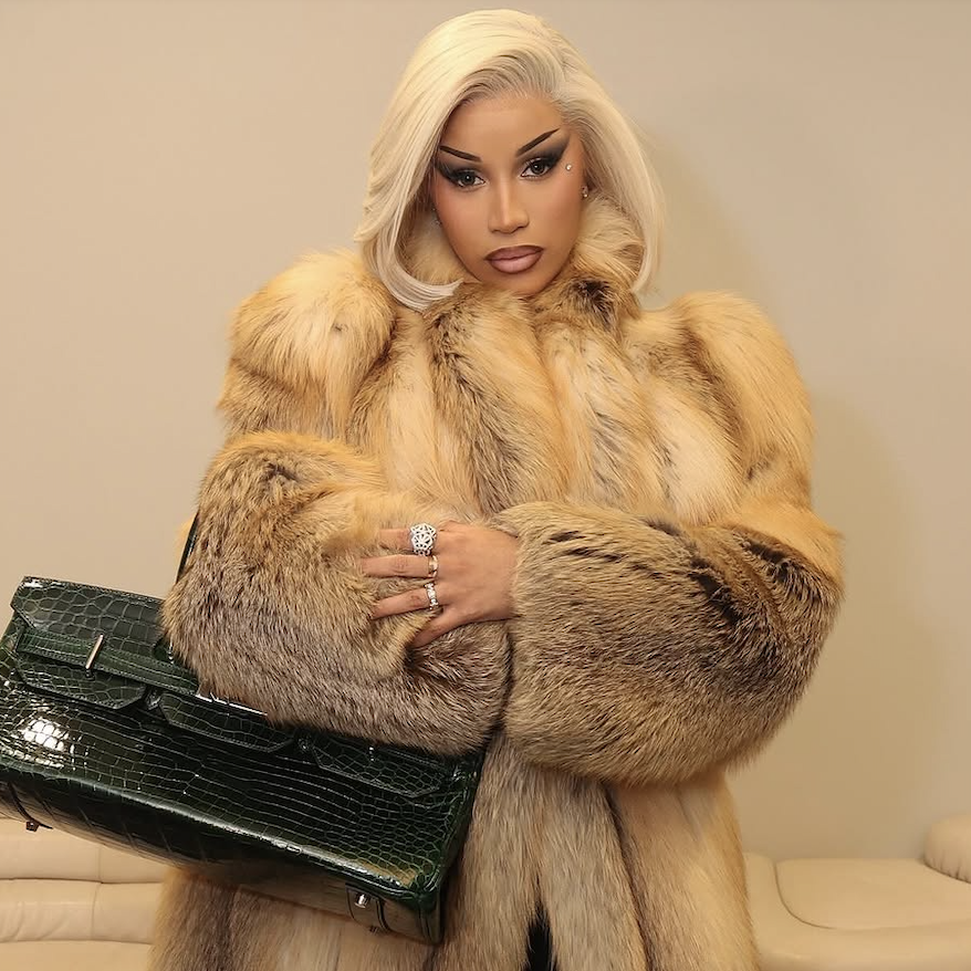 cardi b wears a fur coat and rare john paul gaultier birkin bag