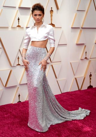 Zendaya attends the 94th Annual Academy Awards wearing a crop top, a Valentino skirt and Bulgari jewelry.