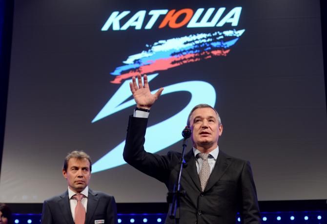 Igor Makarov waves from the podium