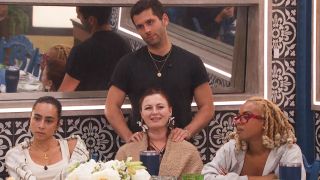 The houseguests consoling each other. 