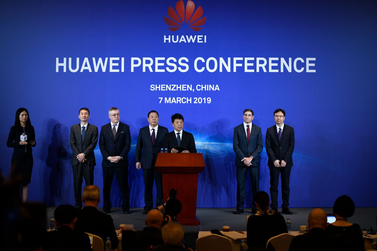 Huawei&amp;#039;s rotating chairman Guo Ping (C) speaks during a press conference in Shenzhen, China&amp;#039;s Guangdong province on March 7, 2019.