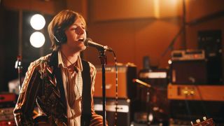 An AI-generated image of Steve Marriott singing in a recording studio in 1971