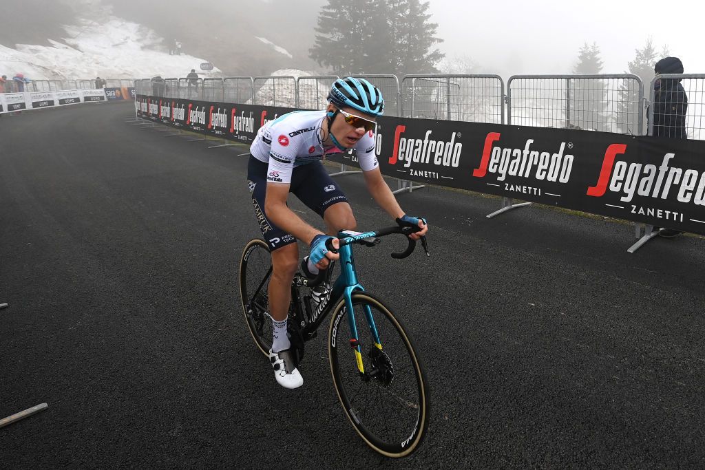 MONTE ZONCOLAN ITALY MAY 22 Aleksander Vlasov of Russia and Team Astana Premier Tech White Best Young Rider Jersey at Monte Zoncolan 1730m during the 104th Giro dItalia 2021 Stage 14 a 205km stage from Cittadella to Monte Zoncolan 1730m UCIworldtour girodiitalia Giro on May 22 2021 in Monte Zoncolan Italy Photo by Stuart FranklinGetty Images