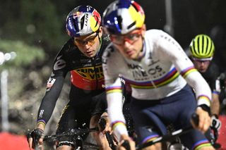 2022 Cyclocross World Champion Tom Pidcock followed by former champion Wout van Aert
