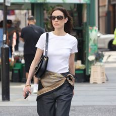 alexa chung wears a silk scarf on her waist