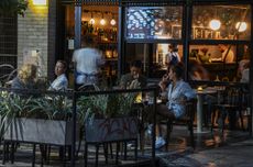 Diners at a pavement cafe