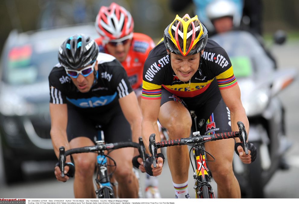 A determined Boonen drills the front of the race