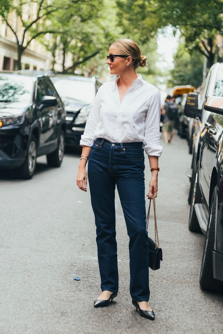 Woman in NYFW street style denim outfit.