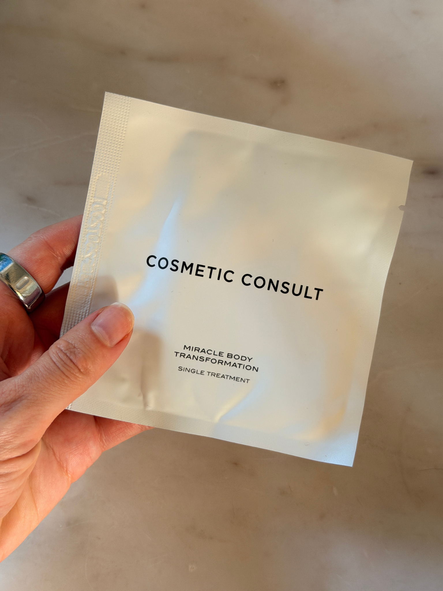 Grace Day holding the Cosmetic Consult body treatment