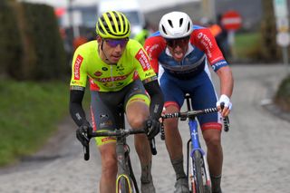 NOKERE BELGIUM MARCH 17 Ludovic Robeet of Belgium and Team Bingoal WB Damien Gaudin of France and Team Total Direct Energie during the 75th Nokere Koerse Danilith Classic 2021 Mens Elite a 1955km race from Deinze to Nokere Breakaway Attack NokereKoerse on March 17 2021 in Nokere Belgium Photo by Luc ClaessenGetty Images