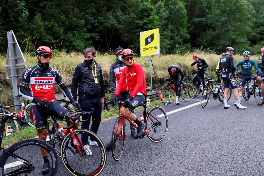 Riders change their clothes prior to the real start of 16th stage of the 108th edition of the Tour de France cycling race 169 km between Pas De La Case and SaintGaudens on July 13 2021 Photo by Thomas SAMSON AFP Photo by THOMAS SAMSONAFP via Getty Images