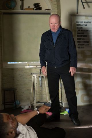 EastEnders Vincent, played by Richard Blackwood, is left a bloody pulp by Phil Mitchell, played by Steve McFadden