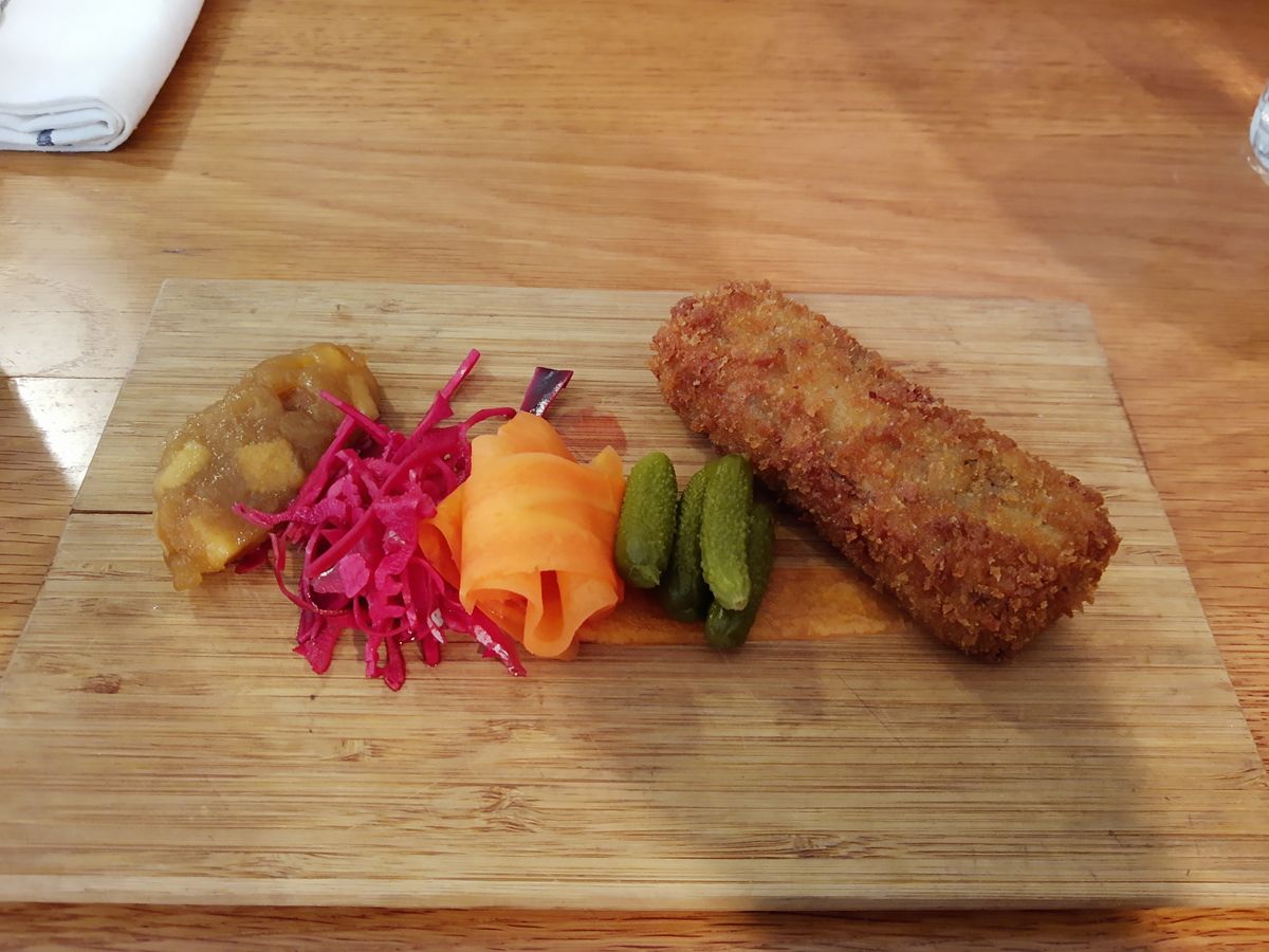 While this second food shot was captured indoors, the vibrancy of the pickles is notable.