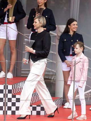 MONTE-CARLO, MONACO - APRIL 27: HSH Princess Charlene of Monaco and Princess Gabriella of Monaco attends the 2024 Monaco E-Prix at Circuit de Monaco on April 27, 2024 in Monte-Carlo, Monaco. (Photo by Arnold Jerocki/WireImage)
