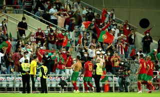 Portugal’s Cristiano Ronaldo (centre) celebrates scoring his injury-time winner against the Republic of Ireland
