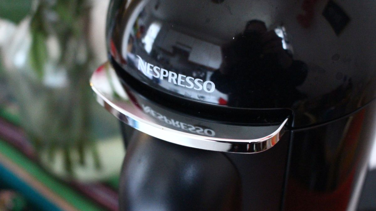 Nespresso Vertuo Plus coffee maker on kitchen counter