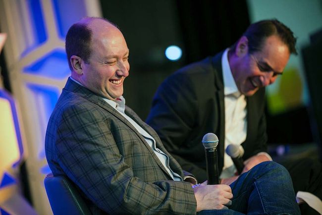 Mike Fisher (l.), executive director of investment innovation, GroupM, and Jon Lafayette, senior content producer-business, B+C, share a laugh during the Advanced Advertising Summit&rsquo;s opening keynote conversation.