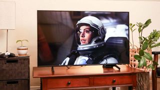 Samsung DU8000 LED TV on console in living room