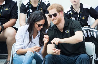 Prince Harry and Meghan Markle pictured laughing
