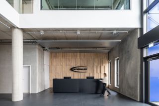 reception at Schwalbe Hybrid Building by Archiproba