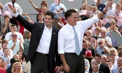 Mitt Romney and Rep. Paul Ryan (R-Wis.) wave as Ryan is announced as Romney's vice presidential running mate in front of the U.S.S. Wisconsin on Aug. 11 in Norfolk, Va. Ryan, a seven term con