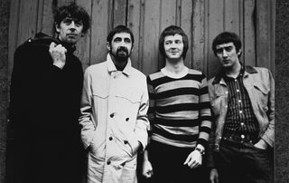 Rock band the "Bluesbreakers" pose for a portrait in 1966 in London, England. L-R: John Mayall, Hughie Flint, Eric Clapton, John McVie.