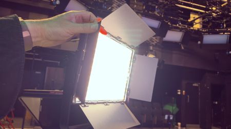 Side shot of the LED to display its adjustable metal barn doors