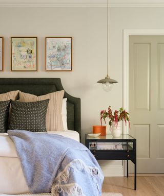 bedroom with neutral scheme and dark headboard