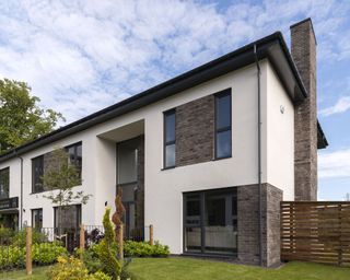 new build home with uPVC grey windows