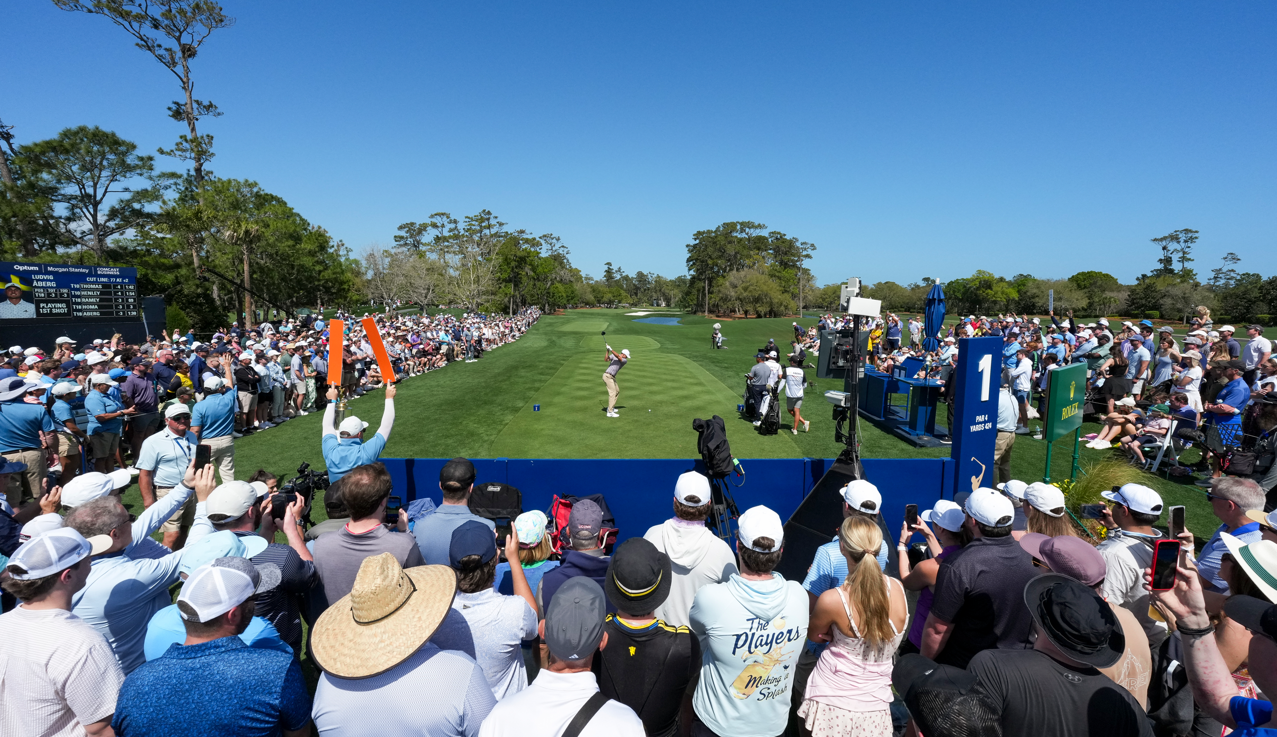 A golfer tees off the first hole at TPC Sawgrass