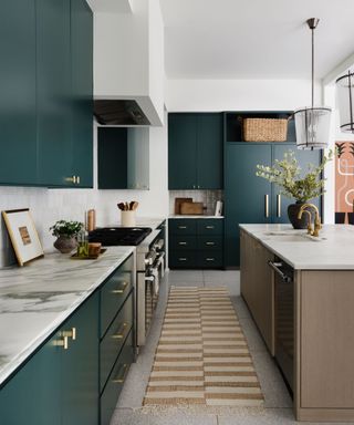modern kitchen with white walls and dark green cabinets