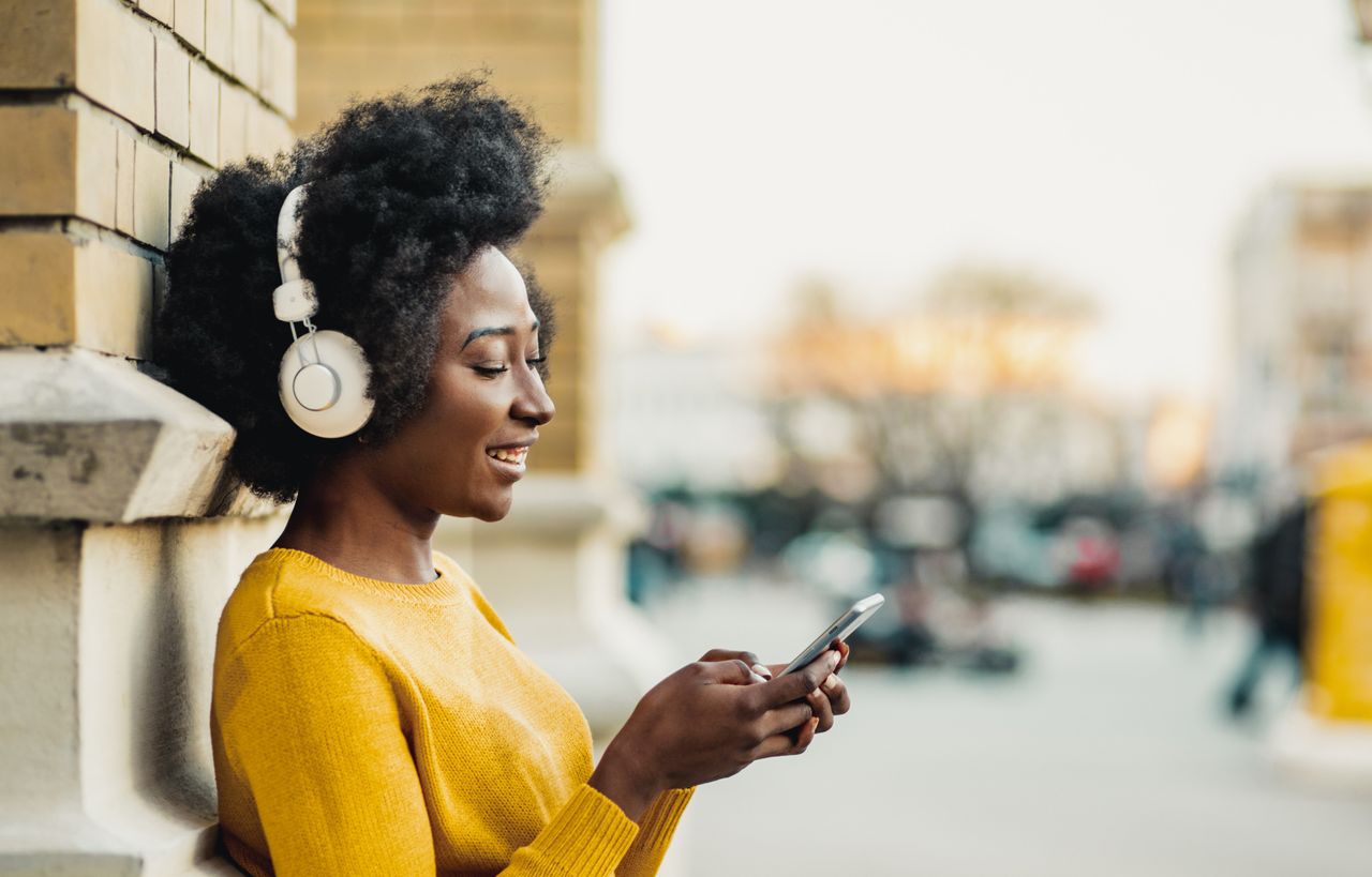 woman listening to podcast