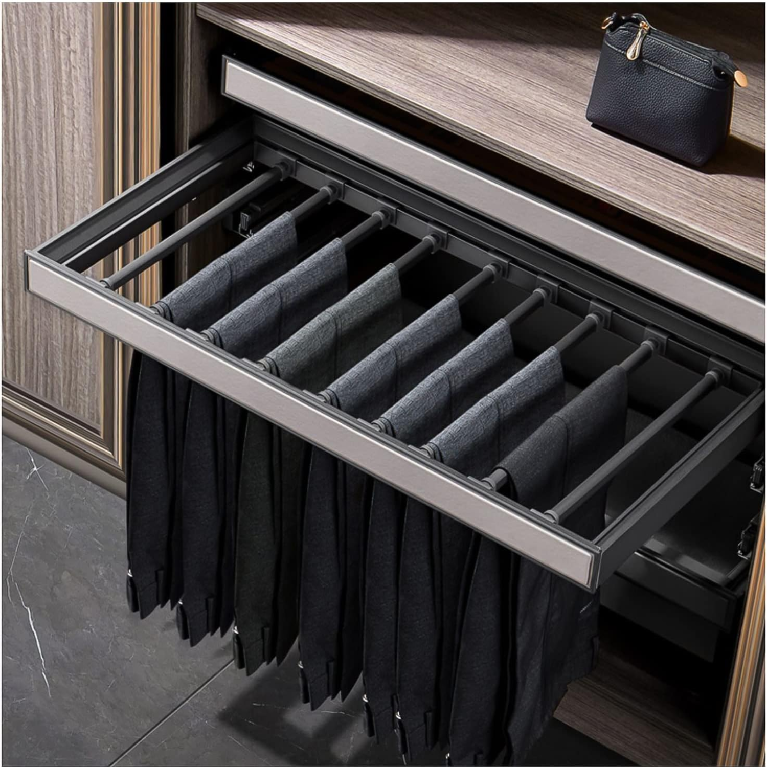 A steel pull out pants rack