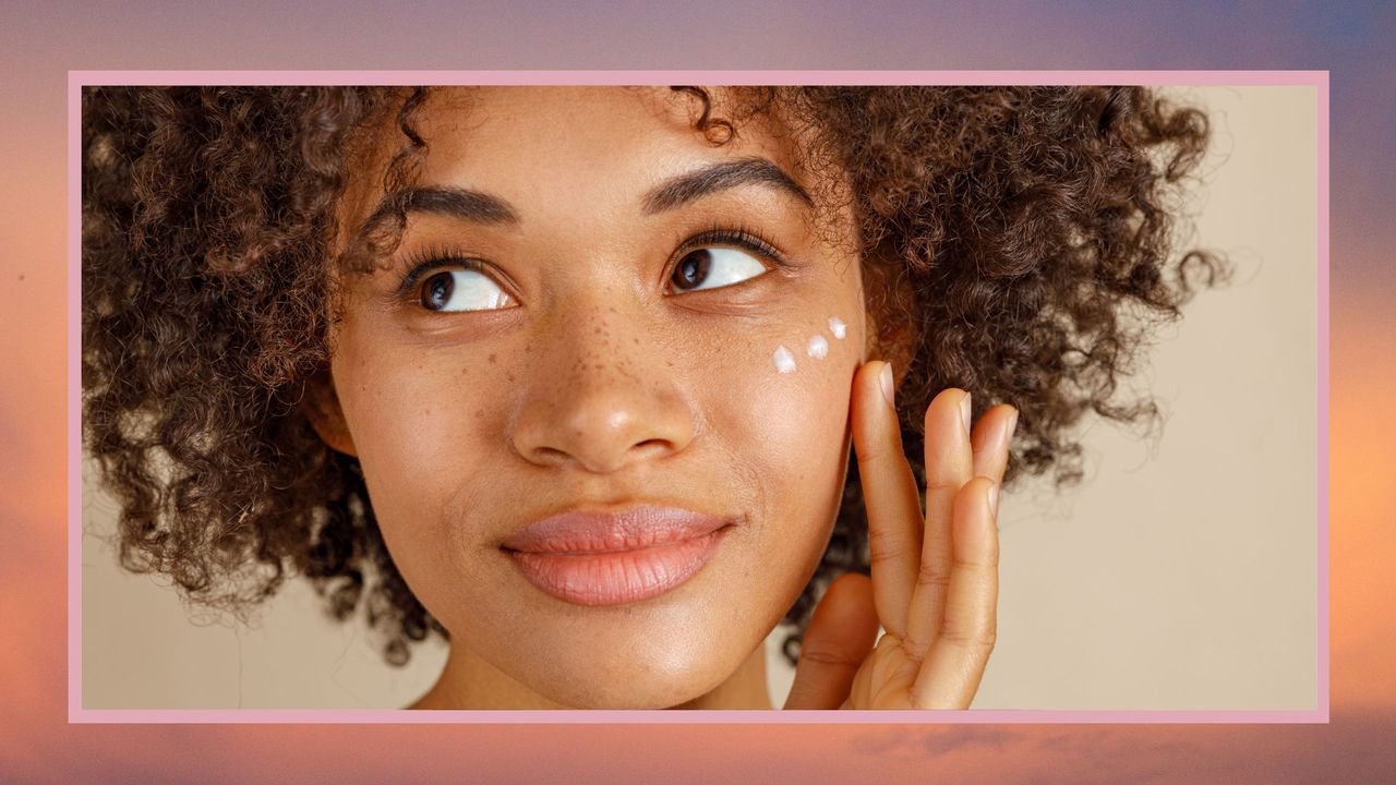 young woman applying moisturizer