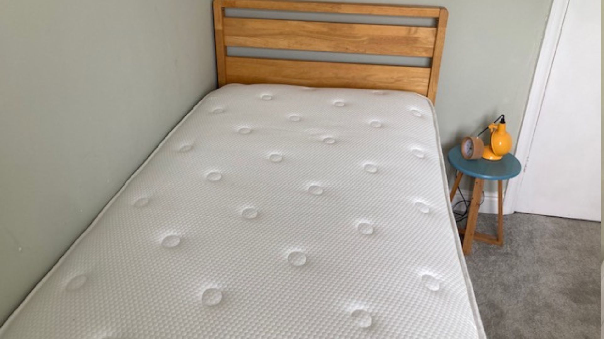 Evermore 1500 Pocket Spring Foam Hybrid Mattress in our tester, Linda's bedroom on a wooden bed frame