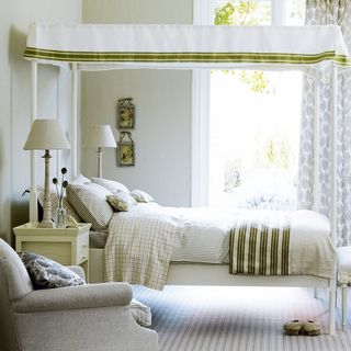 white bedroom with fabric walls