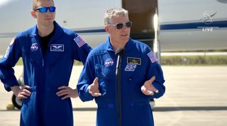 NASA's Woody Hoburg, left, and Crew-6 commander Stephen Bowen, right, during a press conference at Kennedy Space Center on Feb. 21.