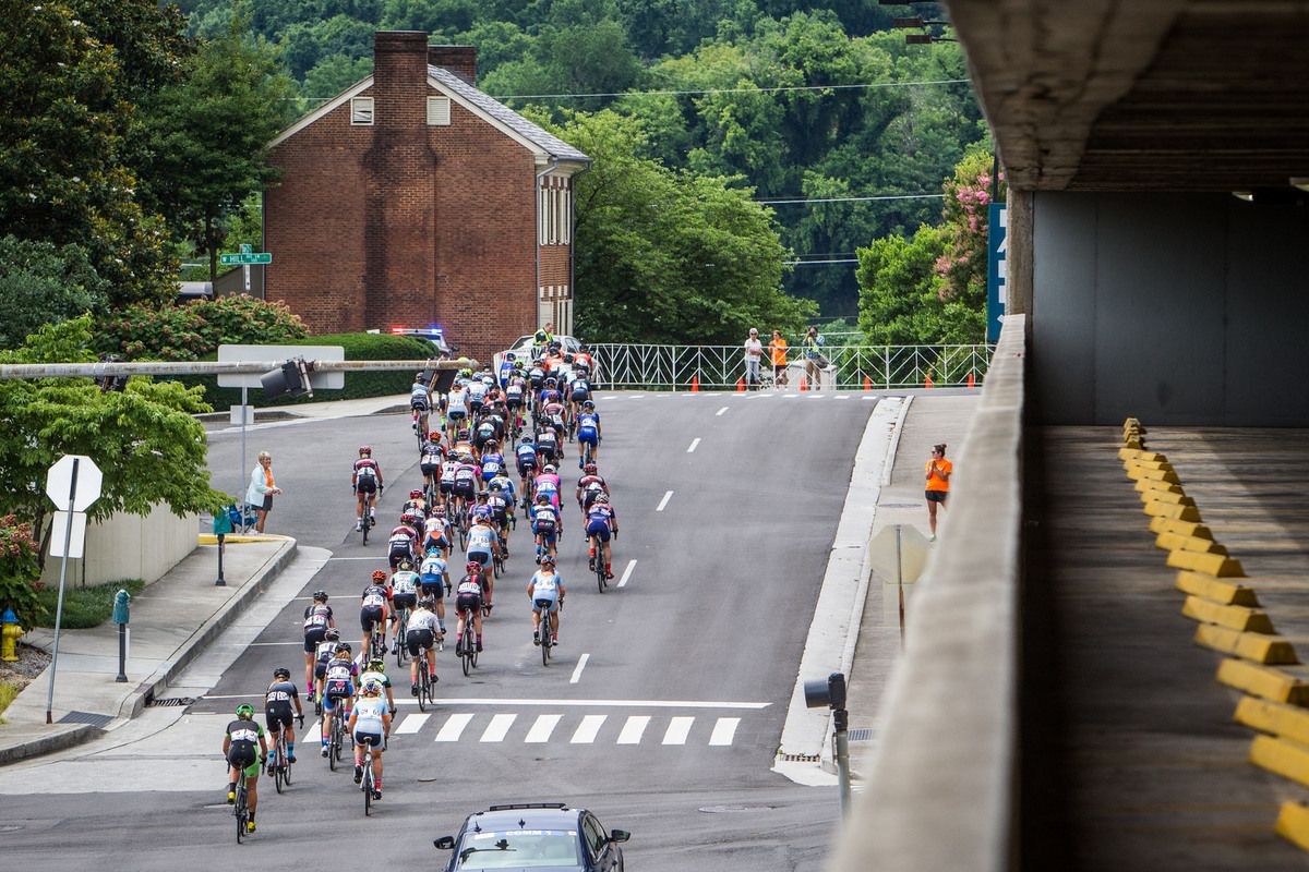 The women pass through downtown