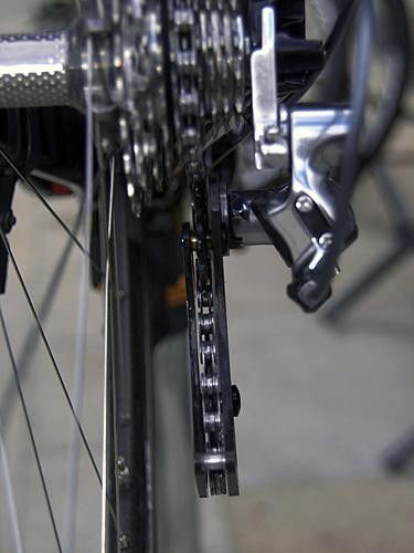 The pulleys and cage plates are both cut from carbon fiber plate so it's all remarkably thin when viewed edge-on.
