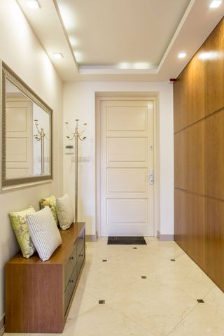 Hallway with wood storage units