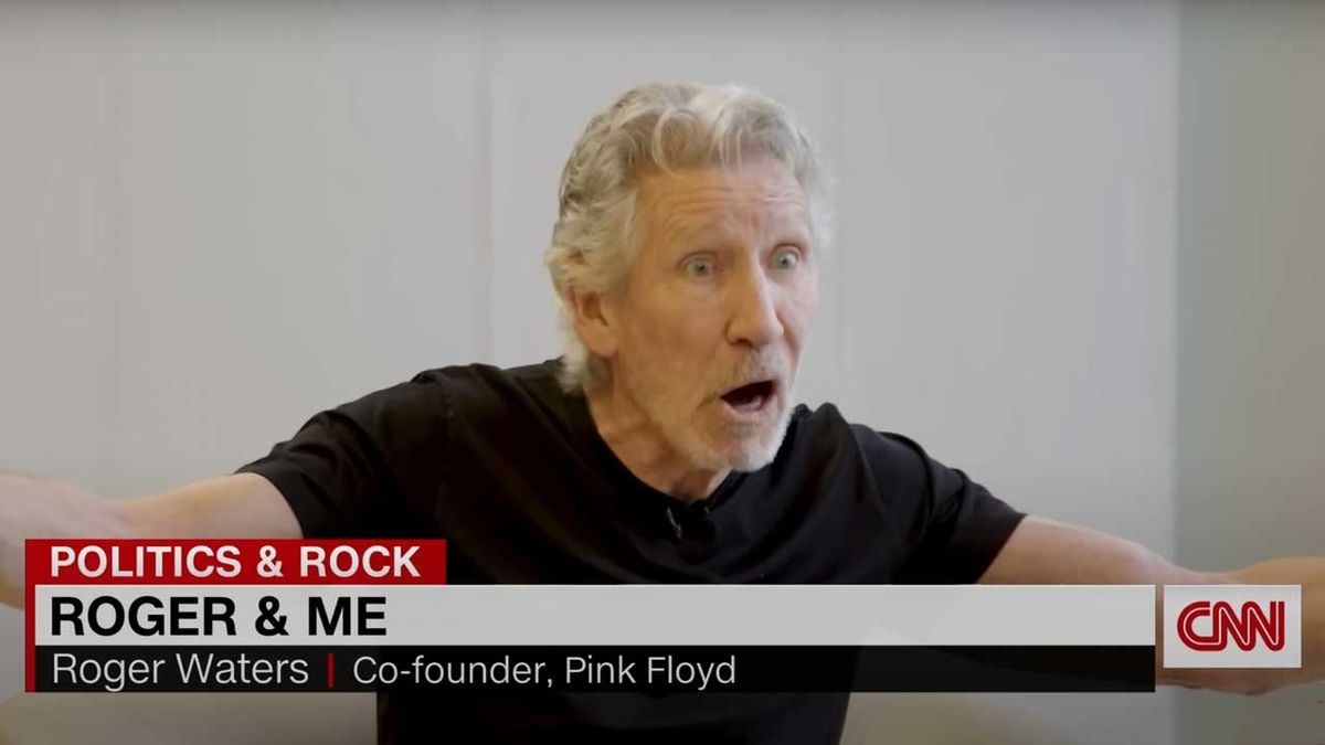 Roger Waters gesticulating during CNN interview