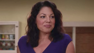 Callie Torres smiles on Grey's Anatomy.