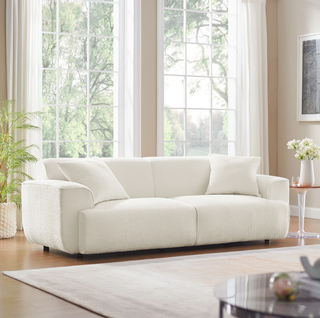 White boucle sofa.