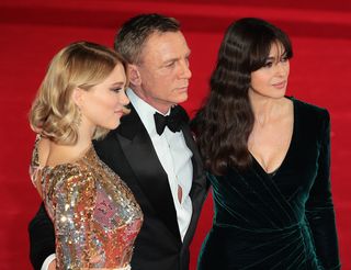 Daniel Craig with the film's two leading ladies, Monica Bellucci (right) and Léa Seydoux (left), attending the "Spectre" film premiere in London.