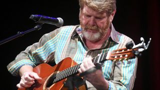 Mac McAnally performs during CMA Songwriters Series Featuring Mary Chapin Carpenter, Vince Gill, Mac McAnally and Don Schlitz at CMA Theater at the Country Music Hall of Fame and Museum on June 6, 2018 in Nashville, Tennessee.